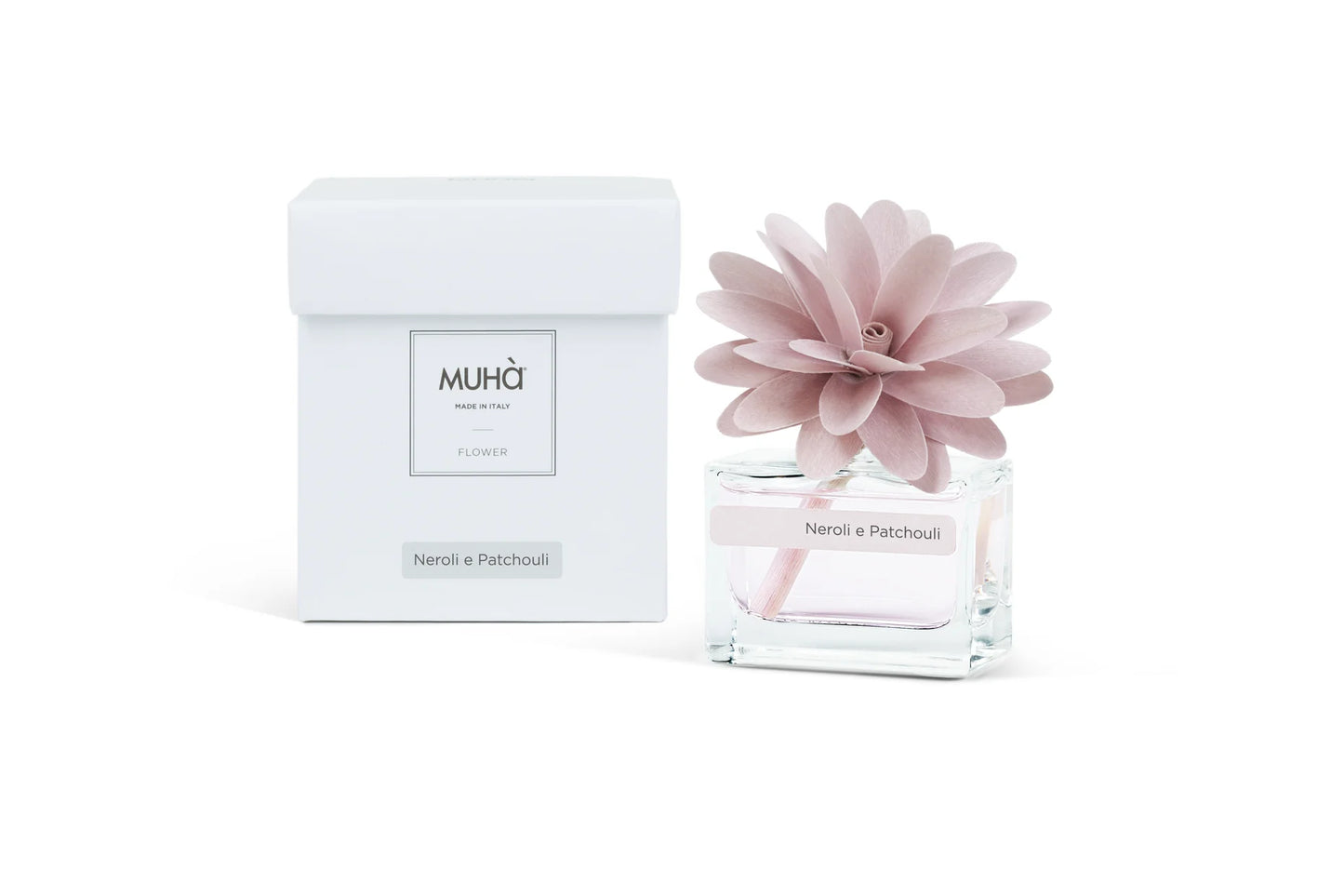 Profumatore ambiente Muha’ Neroli e Patchouli con fiore in legno di betulla e bottiglia in vetro, fragranza agrumata e floreale.