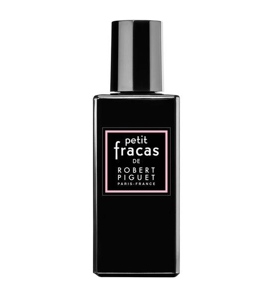 Flacone Petit Fracas Robert Piguet con fiori rosa, profumo fiorito e fruttato